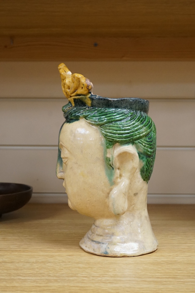 A Chinese Sancai glazed bust of a Bodhisattva, 23cm high